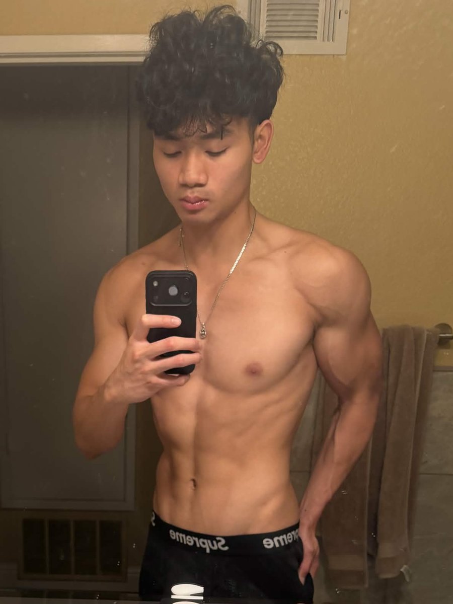 Ethan after, front mirror photo showing a lean, muscular build